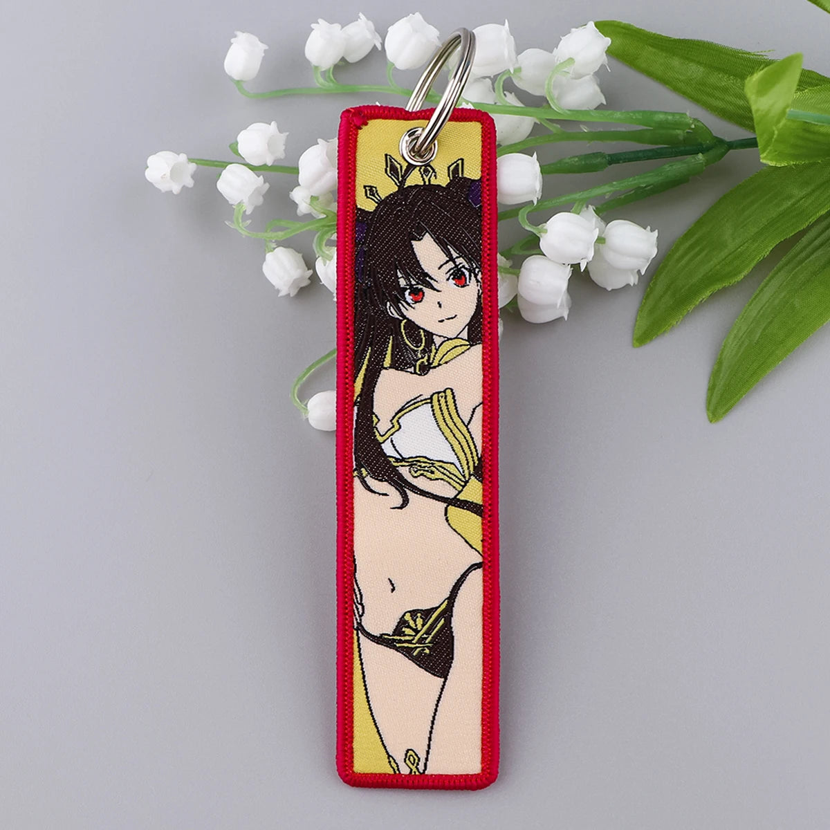 Llavero de anime bordado